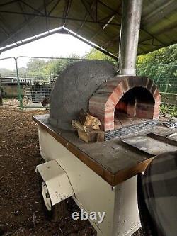 Brick outdoor wood fired pizza oven