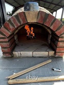 Brick outdoor wood fired pizza oven