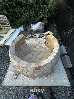 Brick outdoor wood fired pizza oven