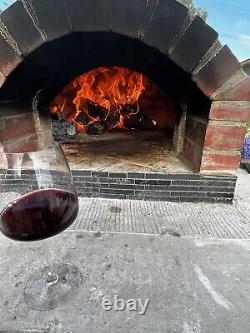 Brick outdoor wood fired pizza oven